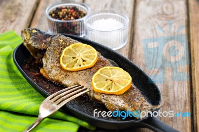 Delicious Baked Rainbow Trout With Lemon Straight From The Oven Stock Photo