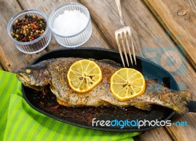 Delicious Baked Rainbow Trout With Lemon Straight From The Oven Stock Photo