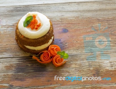 Delicious Carrot Cake On A Rustic Wood Background Stock Photo