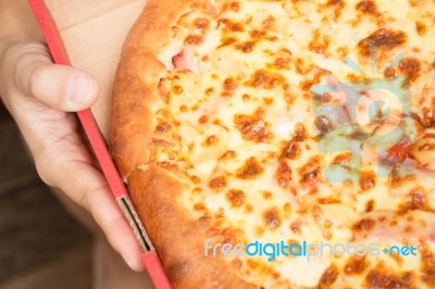 Delicious Pizza Pan With Cheese Crust Stock Photo