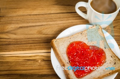 Delicious Slice Of Bread With Strawberry Jam Heart Shape Stock Photo