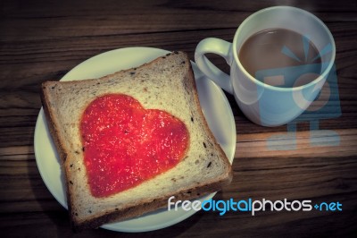 Delicious Slice Of Bread With Strawberry Jam Heart Shape Stock Photo