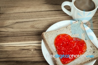 Delicious Slice Of Bread With Strawberry Jam Heart Shape Stock Photo