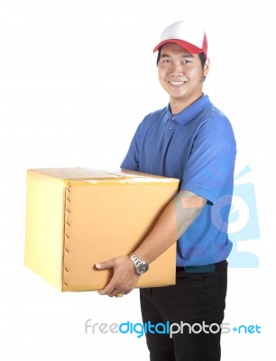 Delivery Man Toothy Smiling Face And Holding Paper Box Container Isolated White Background Stock Photo