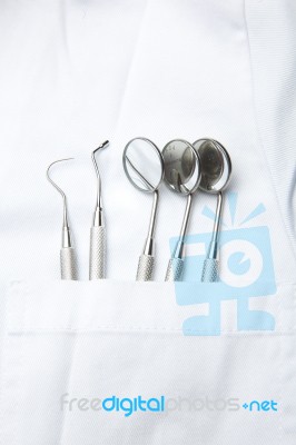 dental tools in dentist pocket Stock Photo