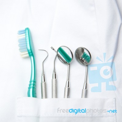 dental tools in dentist pocket Stock Photo