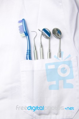 dental tools in dentist pocket Stock Photo