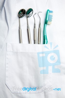 dental tools in dentist pocket Stock Photo