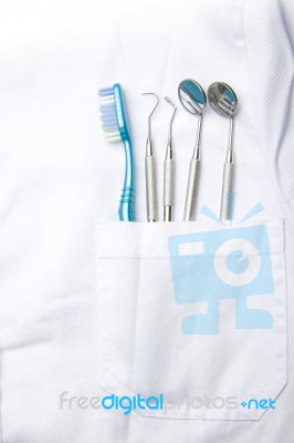 dental tools in dentist pocket Stock Photo