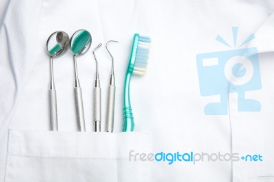 dental tools in dentist pocket Stock Photo