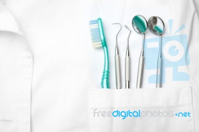 dental tools in dentist pocket Stock Photo