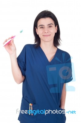 Dentist Holding Toothbrush Stock Photo