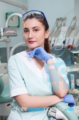 Dentist In Her Office Stock Photo