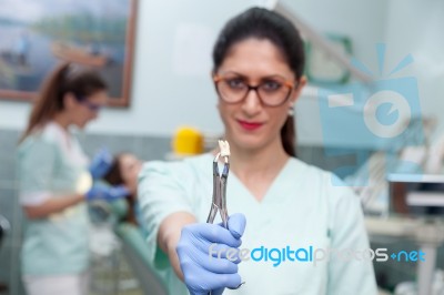 Dentist In Her Office Stock Photo