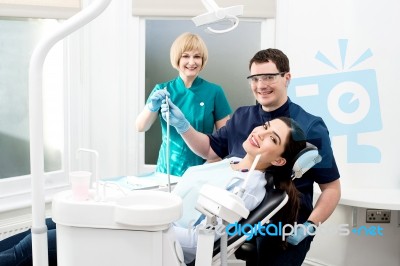 Dentist Ready For The Treatment Stock Photo