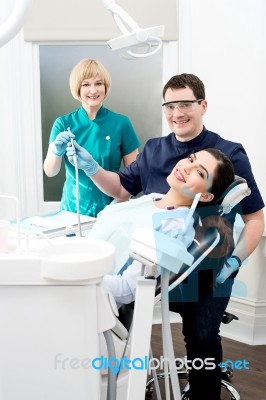 Dentist Ready To Examine The Patient Stock Photo