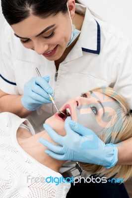 Dentist Whitening A Patient Teeth Stock Photo