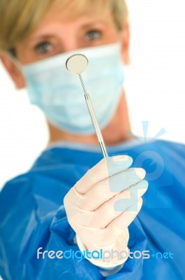 Dentist With Mirror Tool Stock Photo