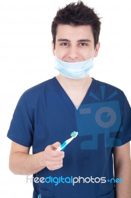 Dentist With Toothbrush Stock Photo