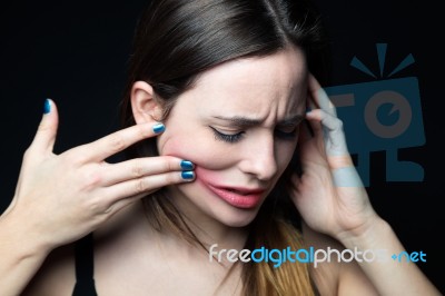Desperate Young Woman Touching Her Face. Concept Of Abuse And De… Stock Photo