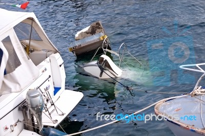 Destroyed  By Thunderstorm Piers With Boats In Verbania, Italy Stock Photo