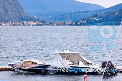 Destroyed  By Thunderstorm Piers With Boats In Verbania, Italy Stock Photo