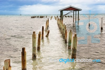 Destroyed Wooden Pier Dock And Ocean View At San Pedro Belize Ca… Stock Photo