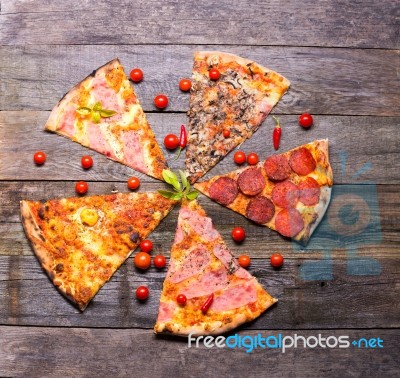 Diferent Pizza Parts On Table, Table Top View Stock Photo