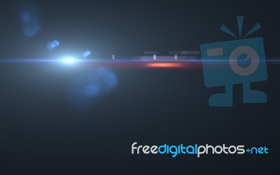 Digital Lens Flare In Black Background.beautiful Rays Of Light Stock Image