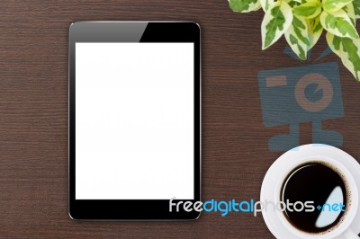 Digital Tablet Blank Screen On Wood Top View Stock Photo