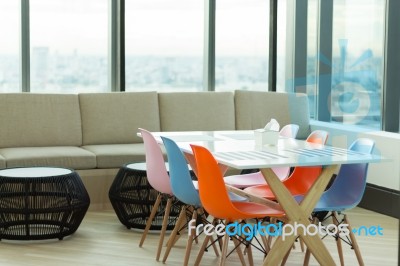 Dining And Living Room With Colorful Chair Stock Photo