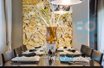 Dinning Room With Black Table And Chair Stock Photo