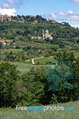 Distant View Of Montepulciano And San Biagio Church Stock Photo