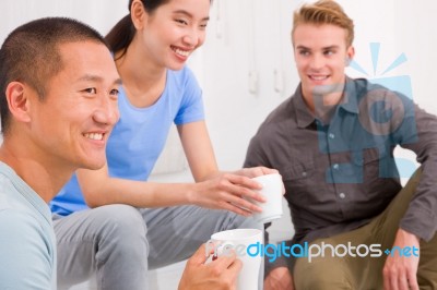 Diverse Group Of Friends Drinking Coffee Stock Photo