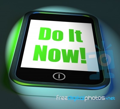 Do It Now On Phone Displays Act Immediately Stock Image