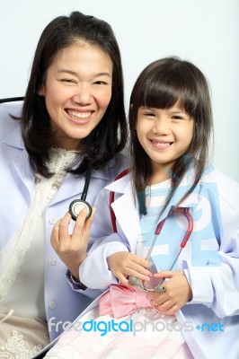 Doctor Checked Children Girl's Body Stock Photo