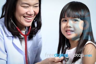 Doctor Checked Children Girl's Body Stock Photo