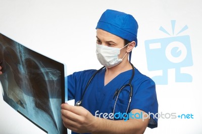 Doctor Checking X-ray Photo Stock Photo