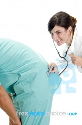 Doctor Examining The Patient Stock Photo