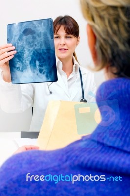 Doctor Examining X Ray Stock Photo