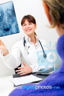 Doctor Examining X Ray Stock Photo