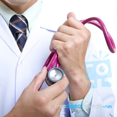 Doctor Holding Stethoscope Stock Photo