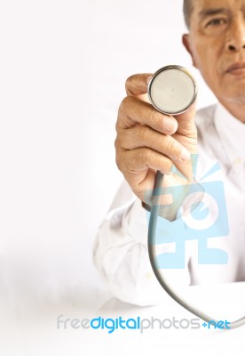 Doctor Holding Stethoscope Stock Photo