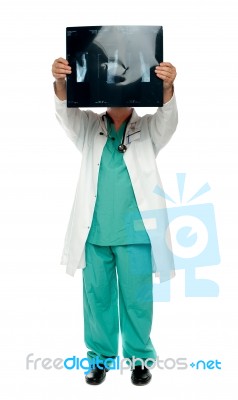 Doctor Holding X Ray Stock Photo