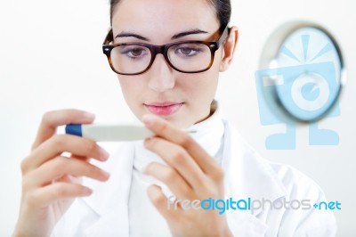 Doctor Nurse Examining Thermometer Stock Photo