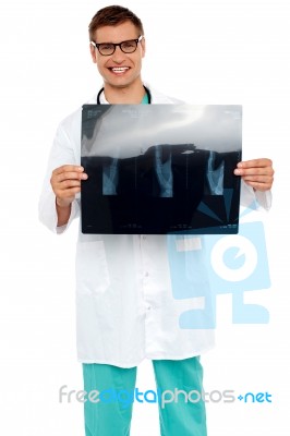 Doctor Showing X Ray Of A Patient Stock Photo