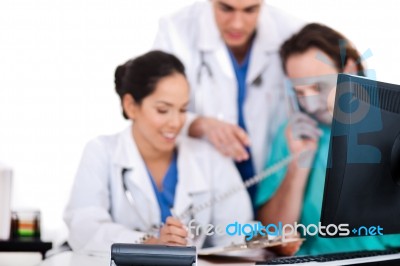 Doctor Team Making Discussion Over Phone Stock Photo