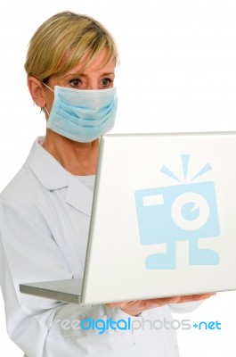 Doctor With Laptop Stock Photo