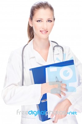 Doctor With Papers And Stethoscope Stock Photo