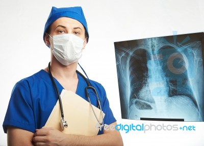 Doctor With Papers In Hand Stock Photo